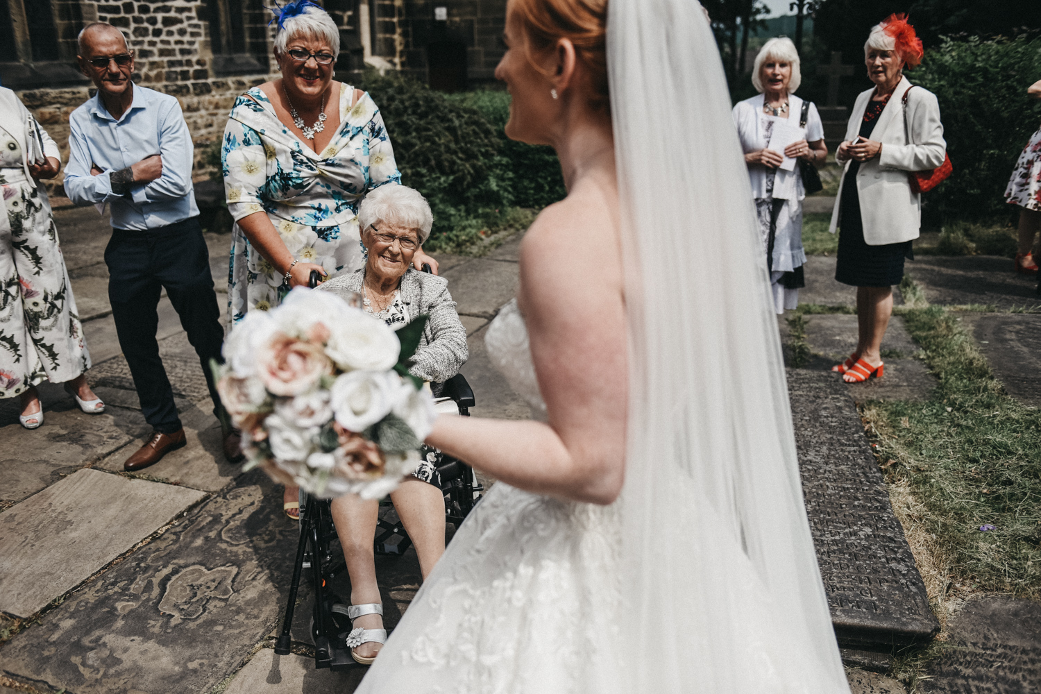 Old lady congratulating the bride