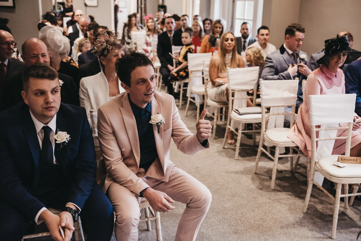 groom hapily waiting