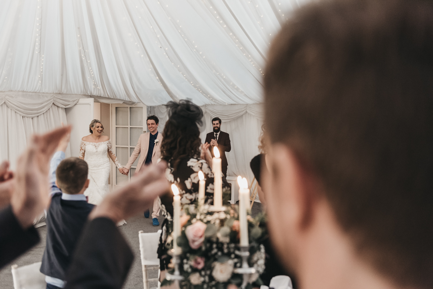 Wedding guests applaunding