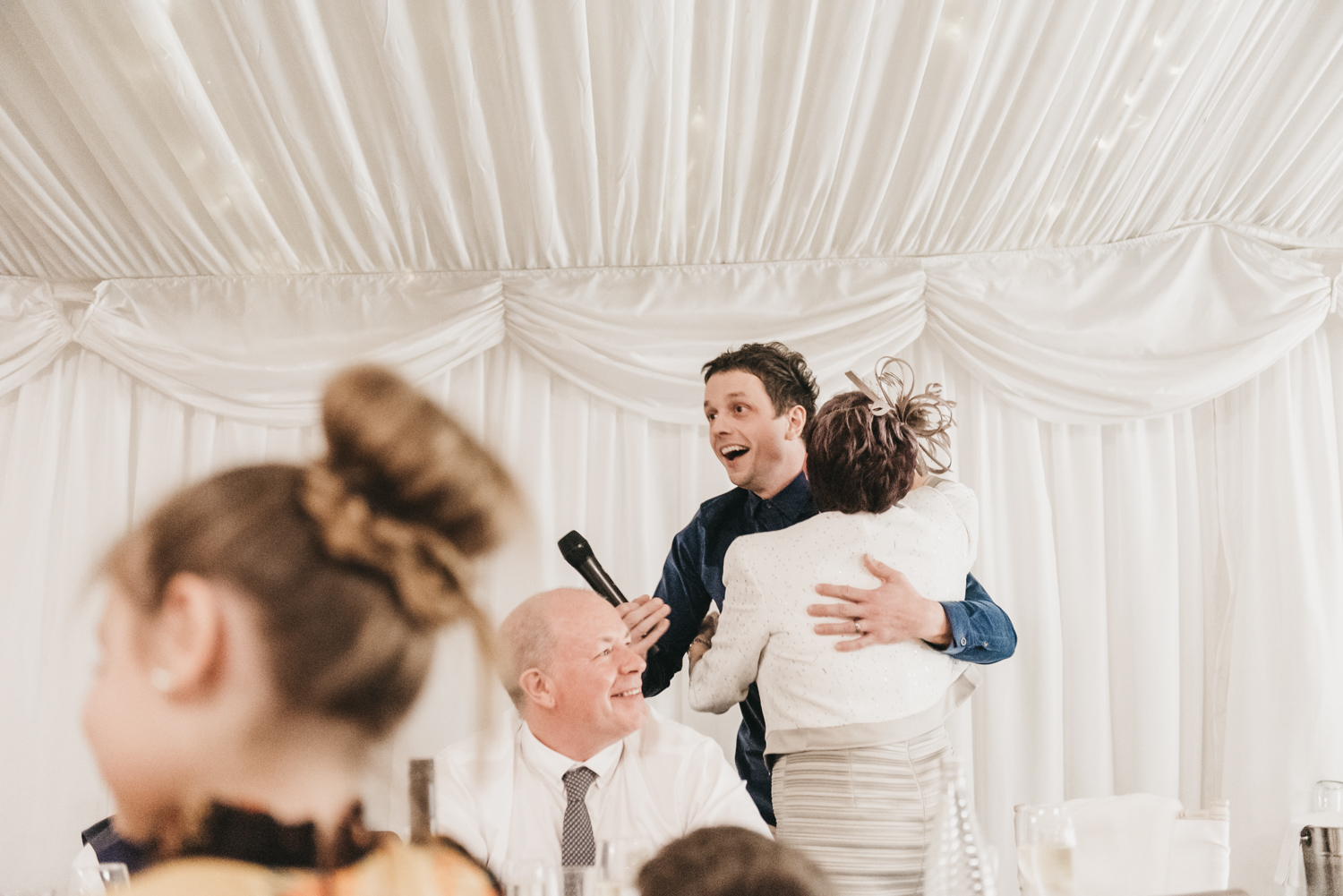 Groom hugging his mother