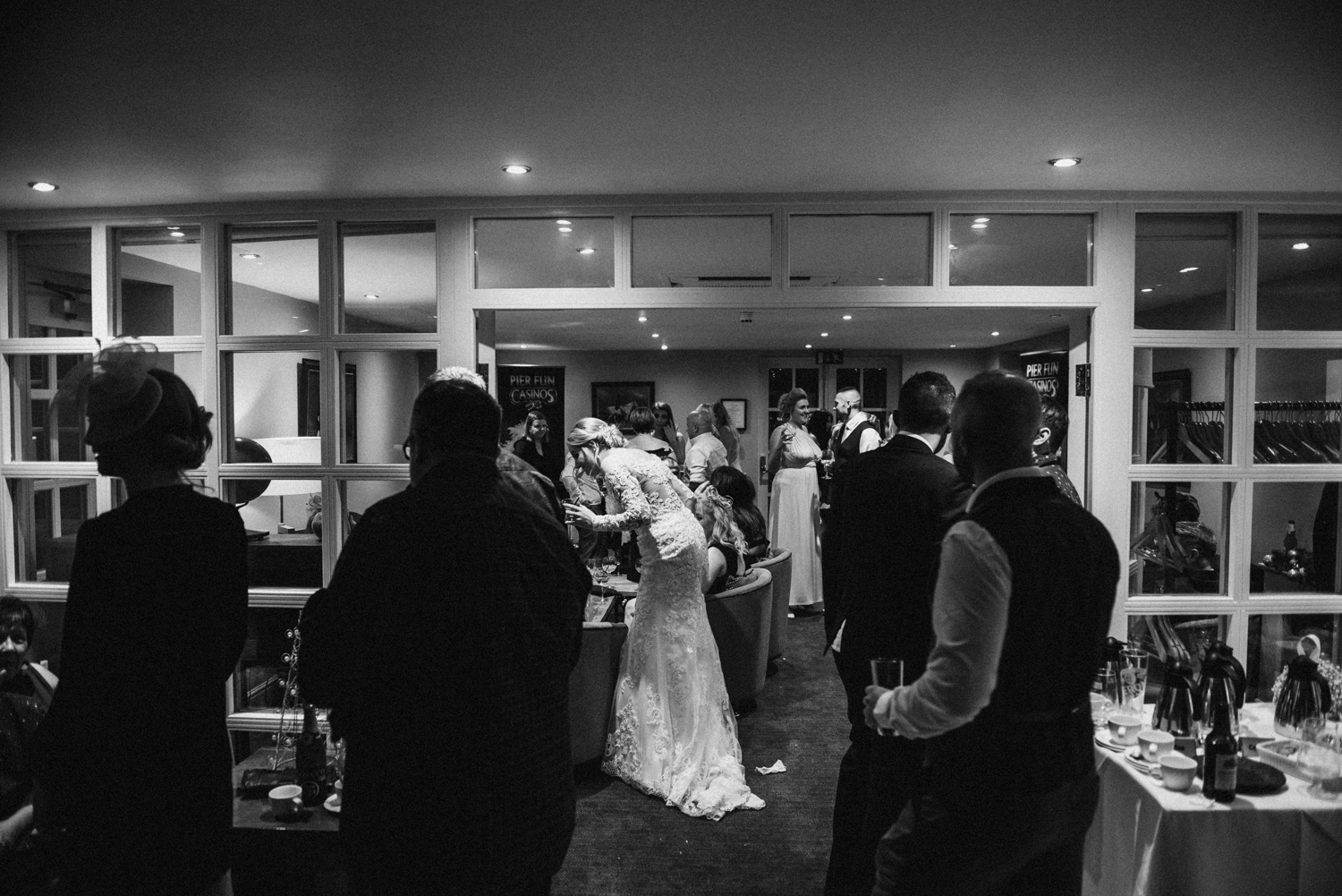 Wedding guest playing casino games