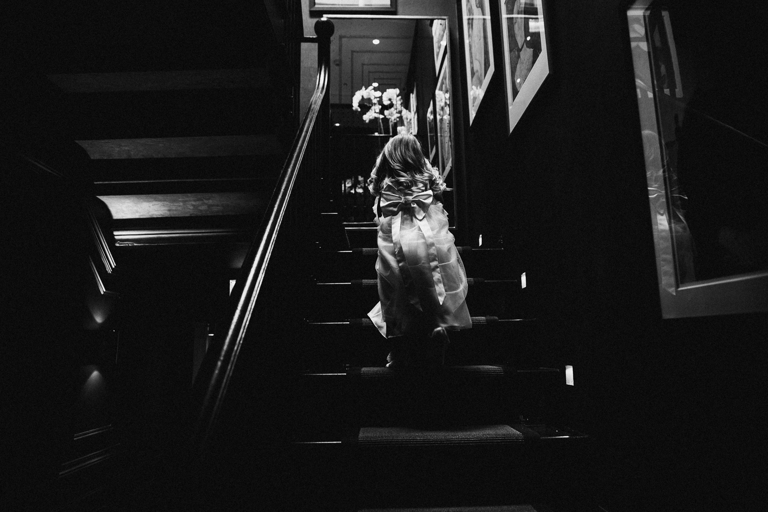 Flower girl climbing the stairs at manor house huddersfield