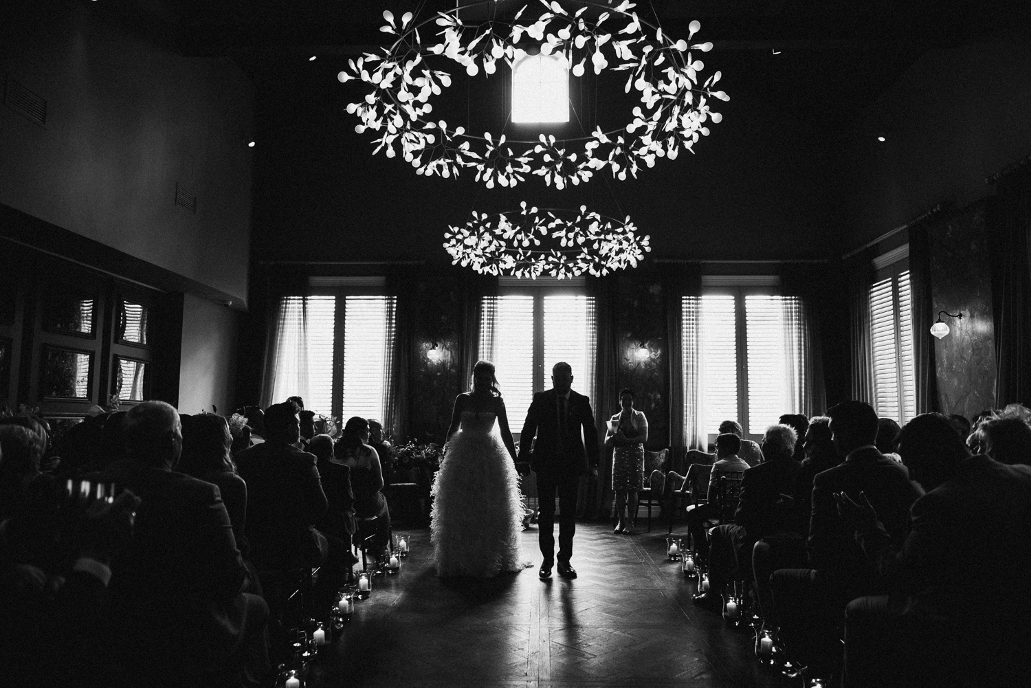Bride and groom walking down the aisle