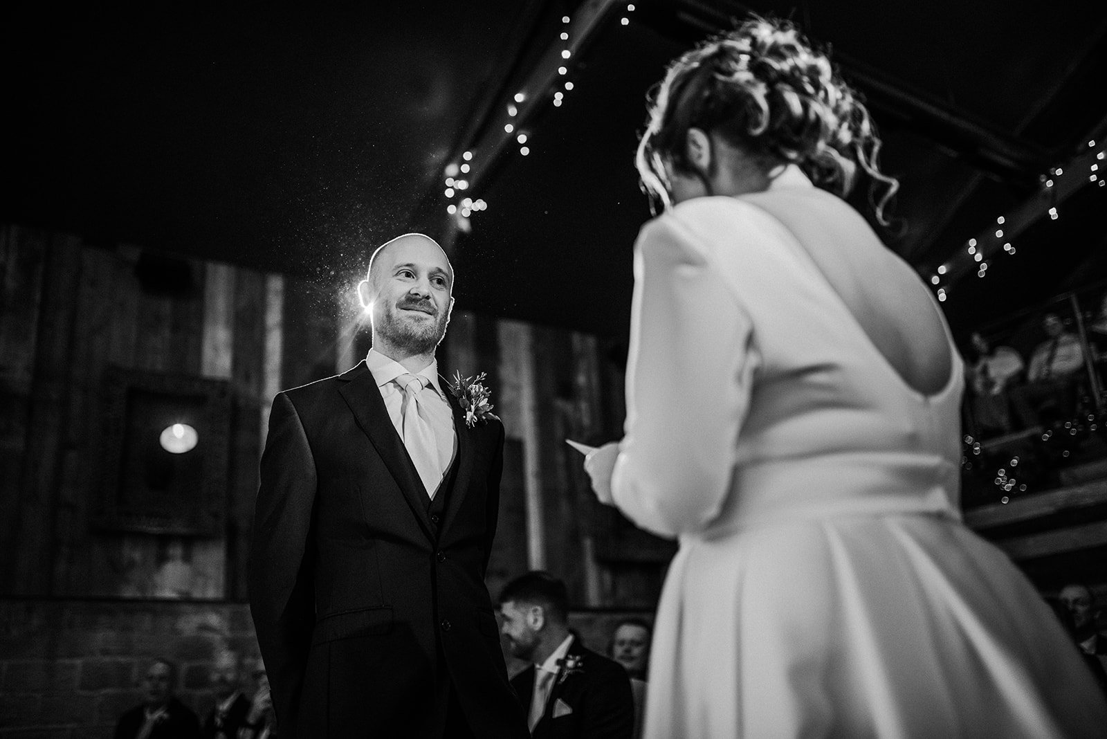 Russ, the groom smiling at his bride