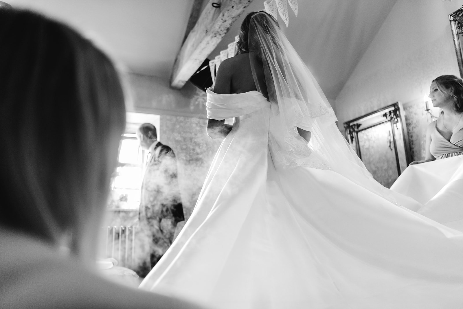Wedding dress being steamed