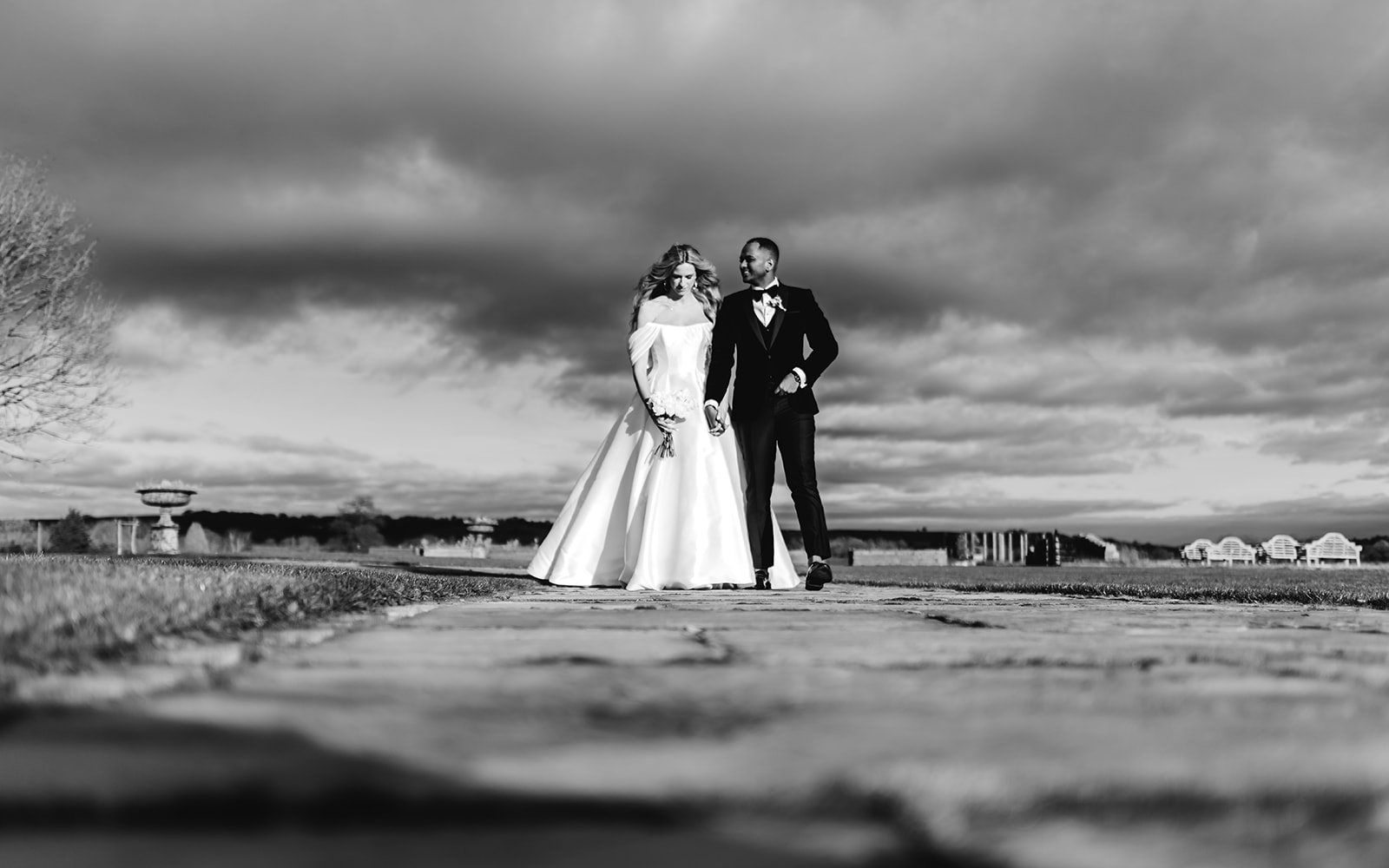 Black and white image of the couple walking