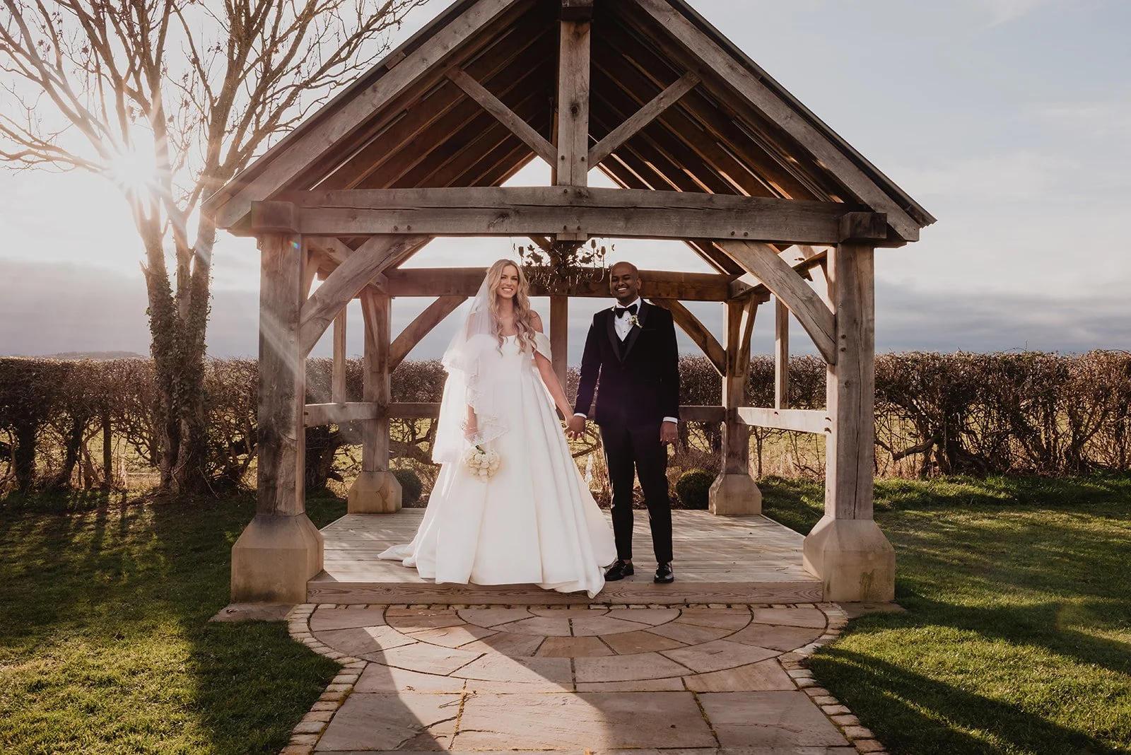 Louise and Evan with the winter sun setting behind them