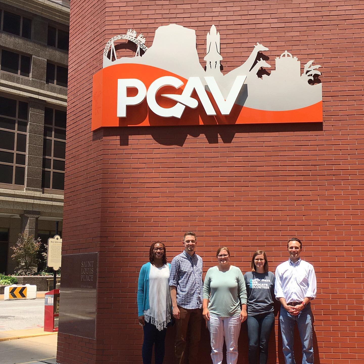 When you get caught under the #PGAV sign by @melissariveratorres, it means it&rsquo;s team photo time! 📸 

Thankful for sunny days and the new @saltandsmokebbq location in @downtownstlouis! #STL