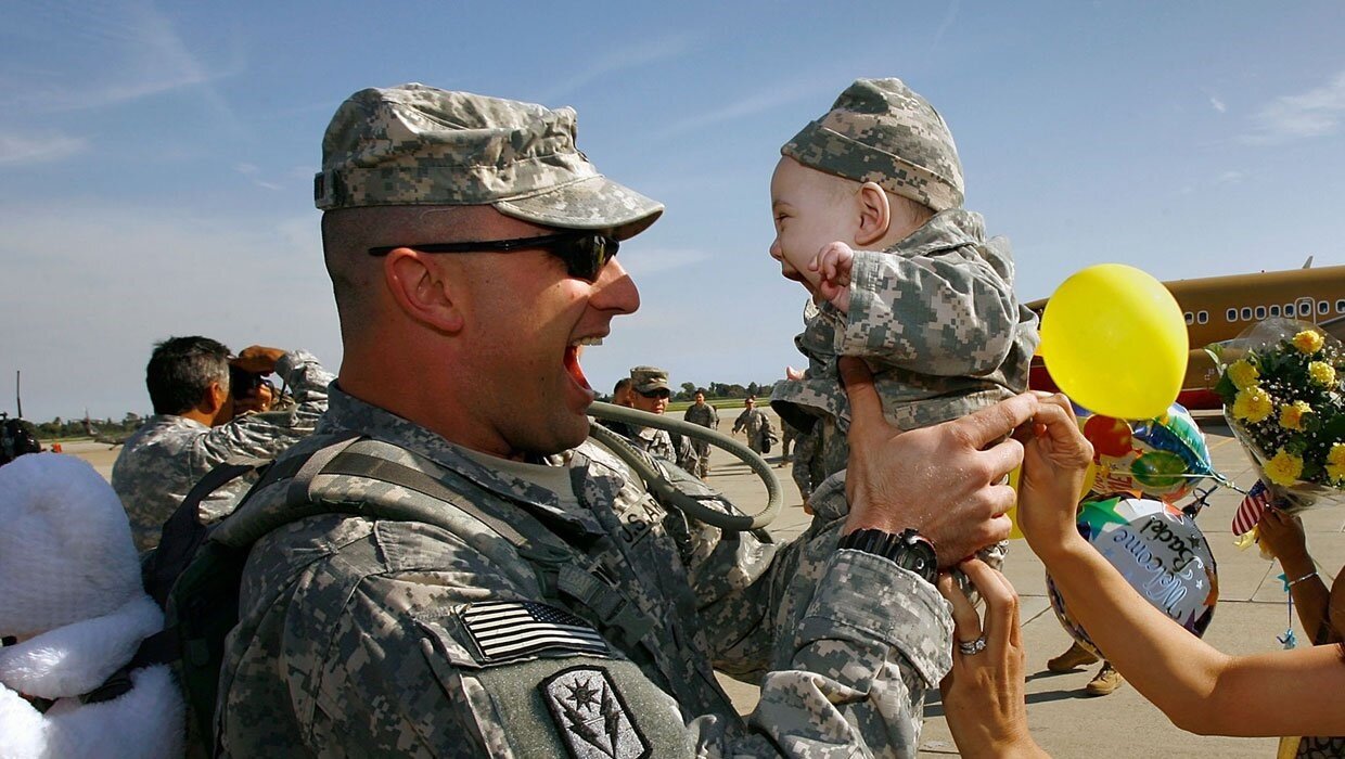 Soldier and his baby reunite.jpg