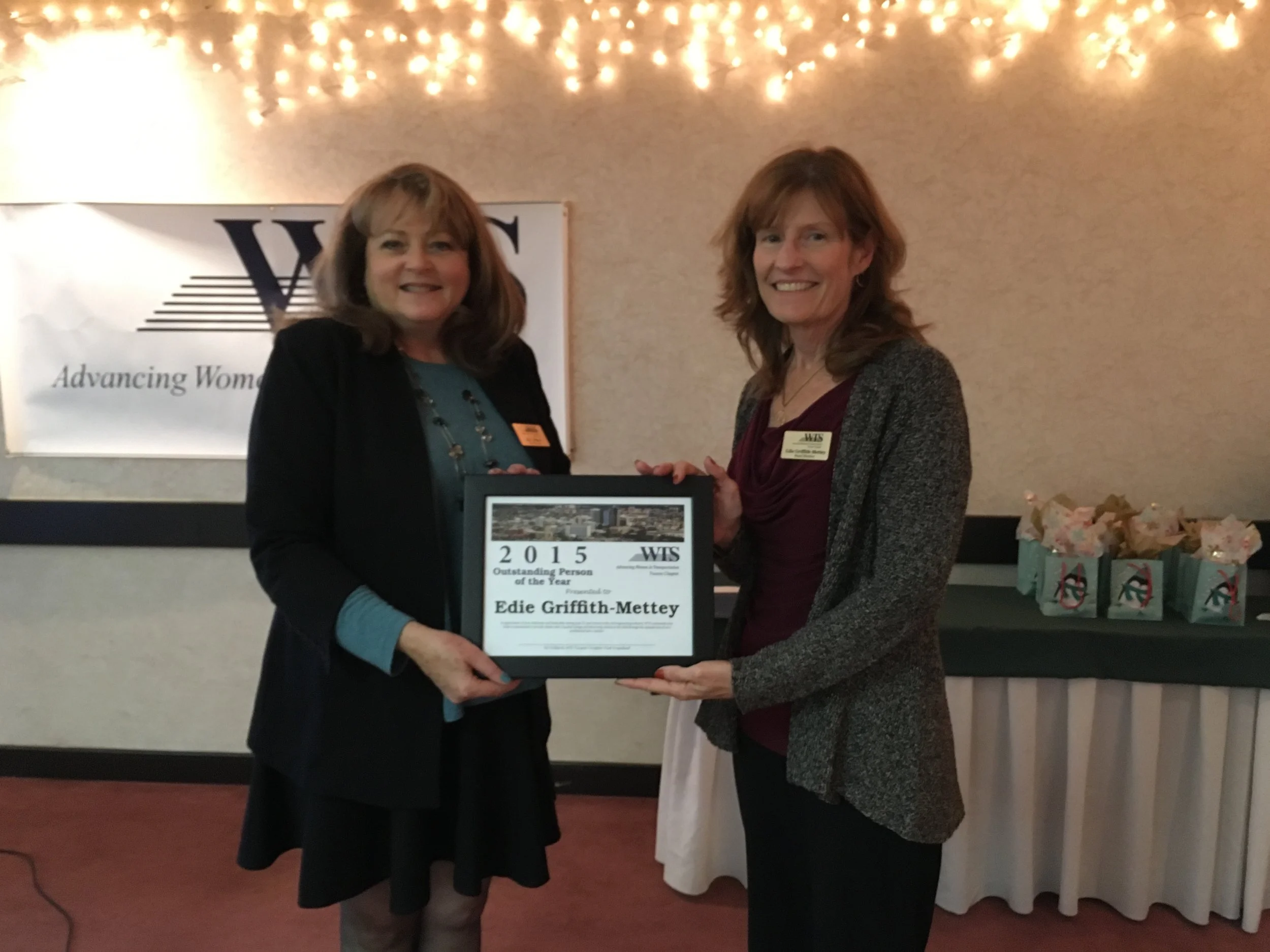Edie Griffith-Mettey receiving the WTS Outstanding Person of the Year award
