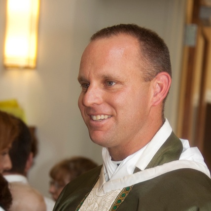 Father-Swink-Greeting-People1.jpg