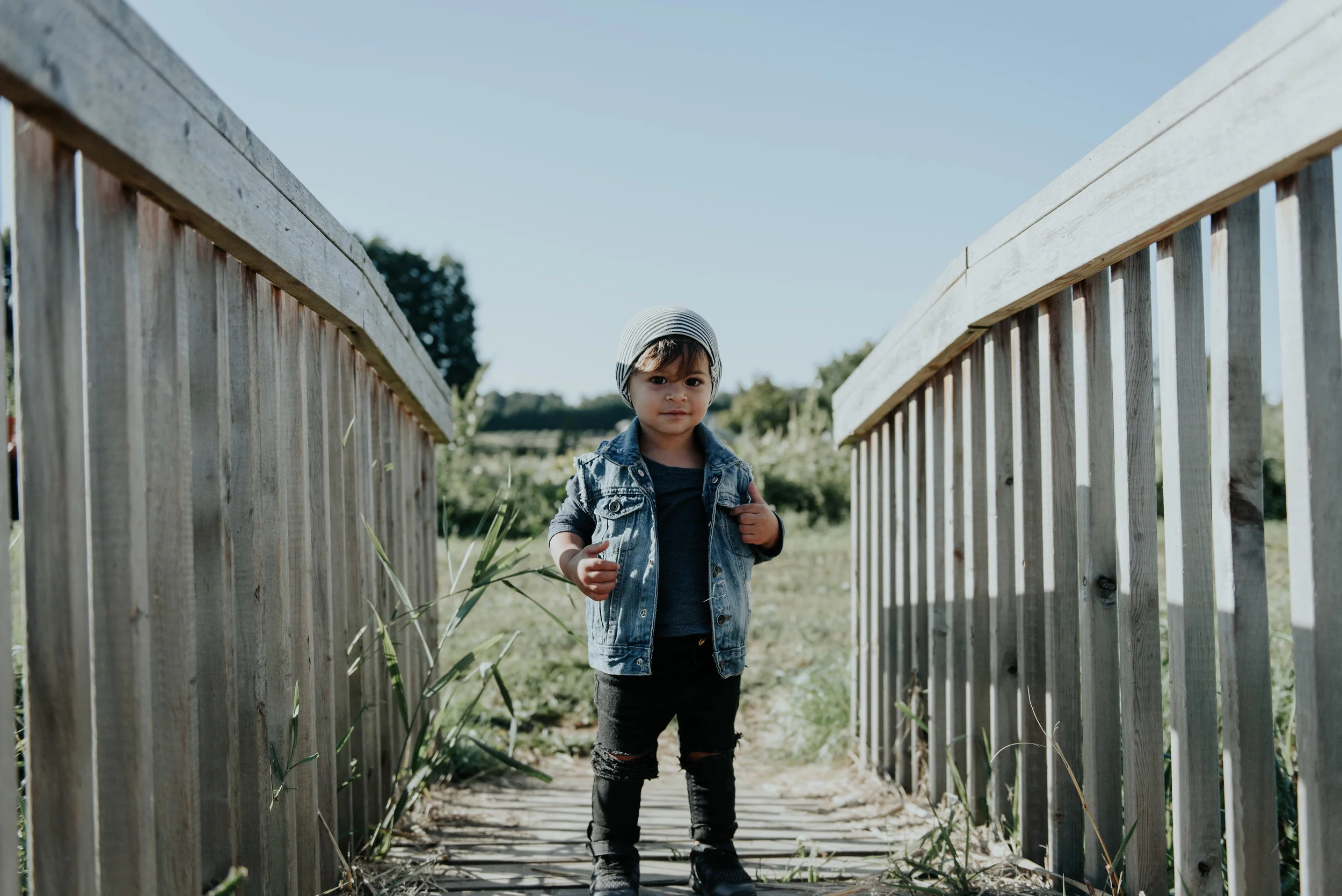 vest & jeans : @tattrdthreads, long sleeve :@vonbonapparel, toque :@northkinder (from @watermelontreekids, shoes are nike. 