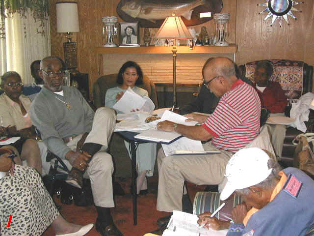   (Left-right) Dorothy Stewart, Vern Stewart, Edris Dade, Chapter President Onnis Berryman, Pauline Berryman Wesley &amp; Sadie Williams (front)&nbsp;hammer out reunion details at the final pre-reunion planning meeting in June, 2004.  