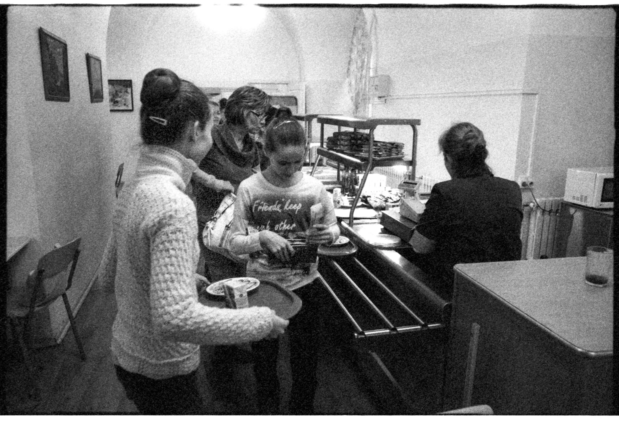 Students grab a quick pre-ballet class breakfast in the academy's cafeteria. Students that live too far to commute live in the academy's dormitory.