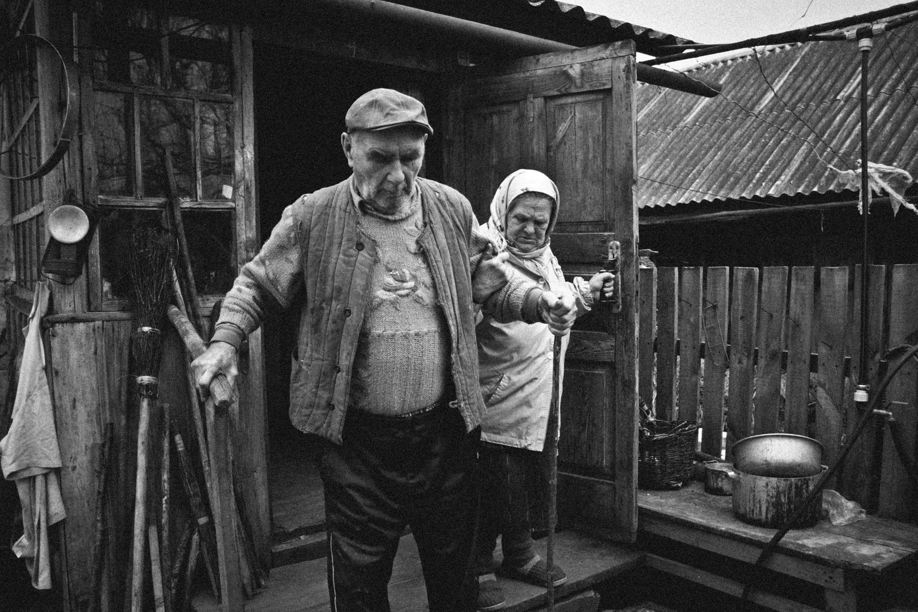 Maria taking Mikhail to the outhouse © Sam Asaert - 2011.jpg