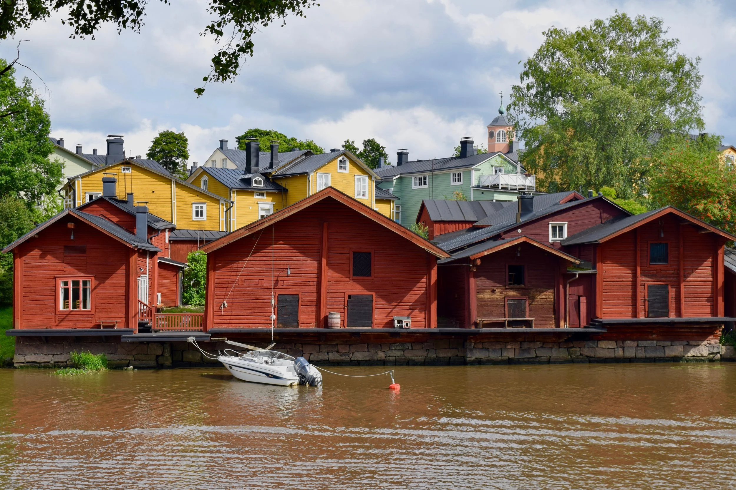 Red houses on the riverbank