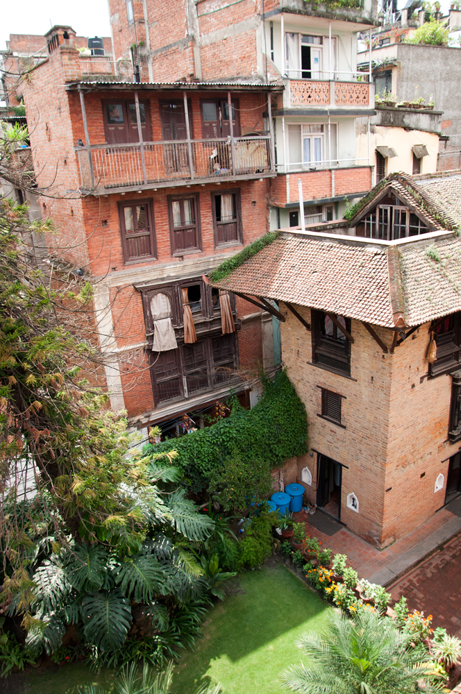 View from the bedroom window. Typical Newari House and beautiful garden.