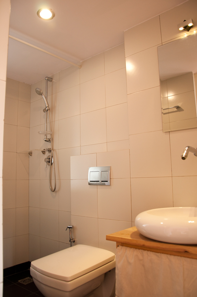 Functional, clean and modern bathroom with hot shower and good pressure.