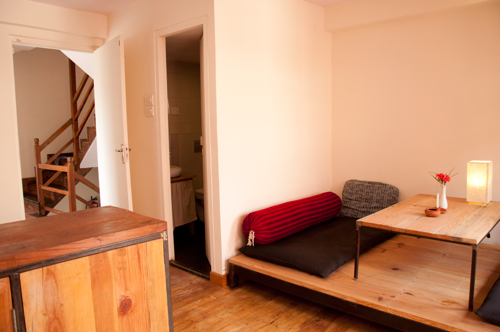 Living room and view of the staircase that lead to the bedroom