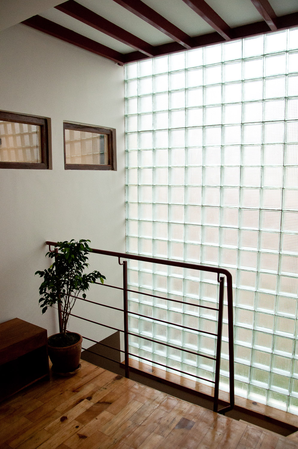 The space where staircase ends, leads to two bedrooms on the 2nd floor.