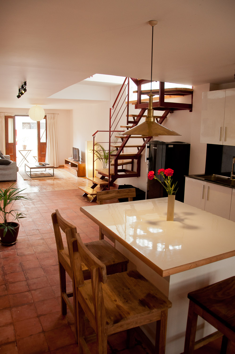 Dining table and a space for living at the back. You can have conversation with your companion while having meal on the table :)