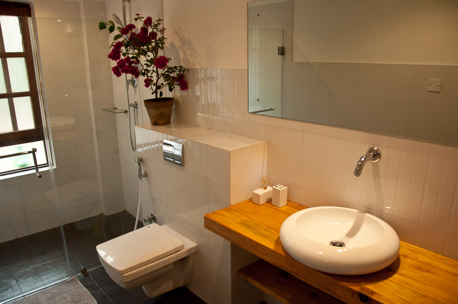 Clean and modern bathroom sink with 24 hours hot water facility.