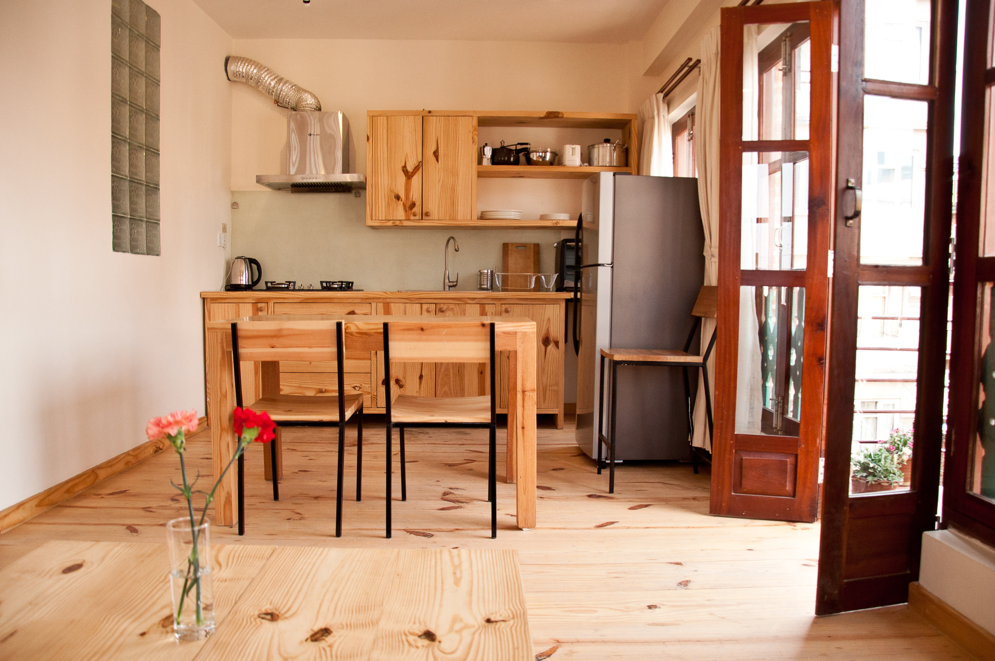 Bright well equipped kitchen.