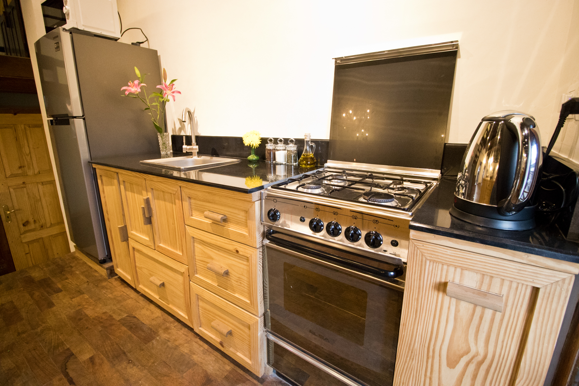 It's a well equipped kitchen with all necessary pots & pans.