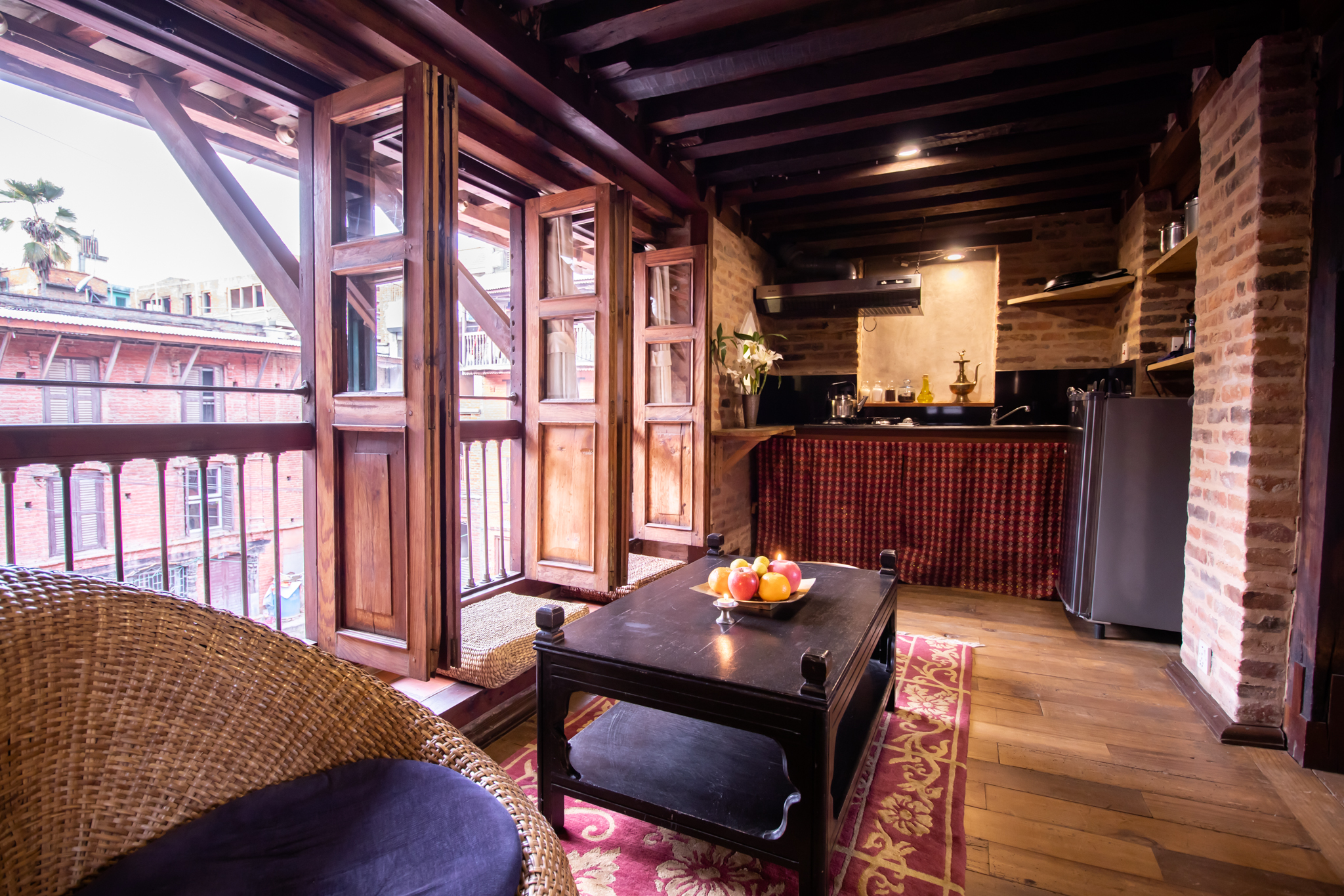 Full length windows with view on a peaceful courtyard.