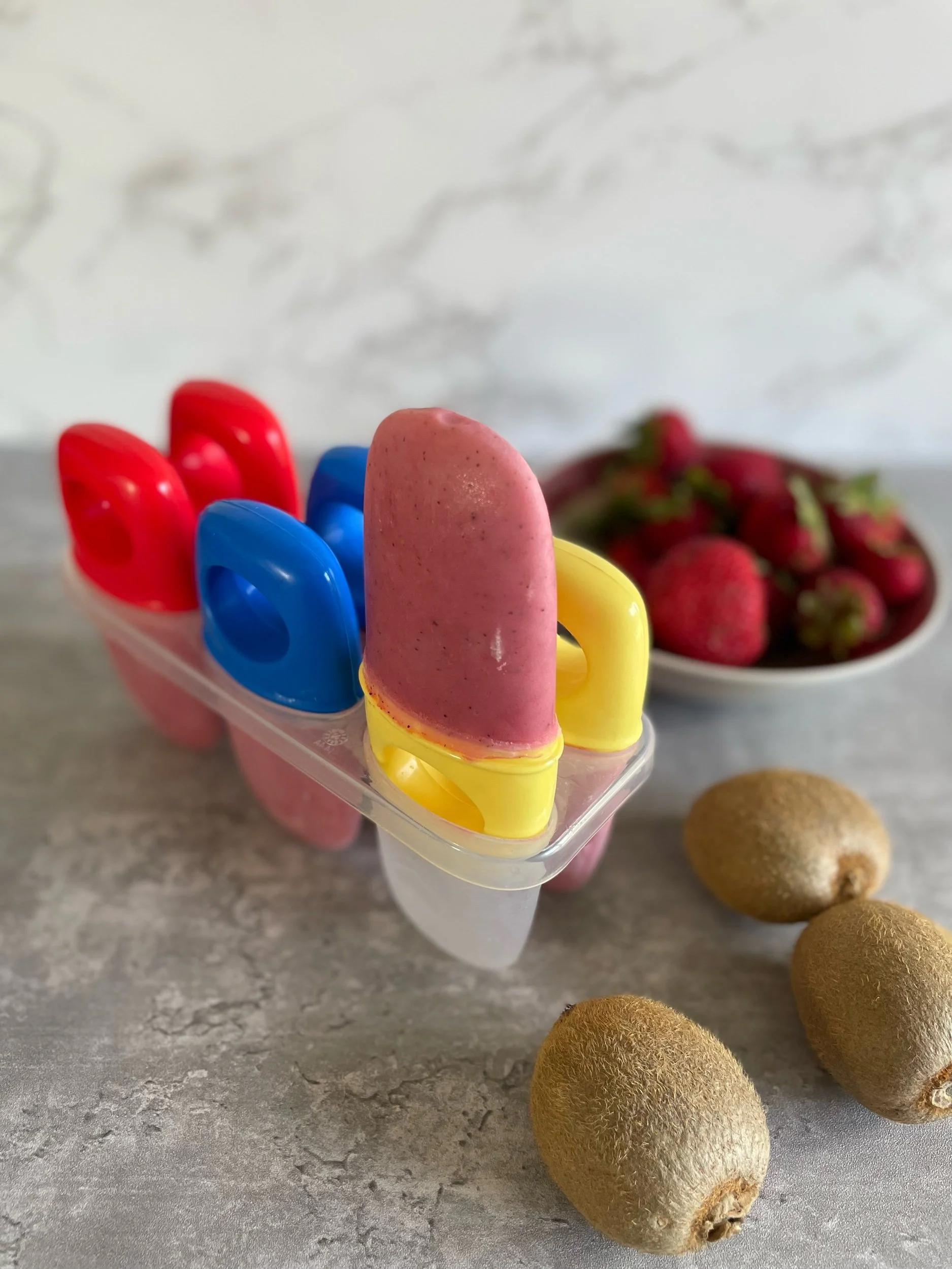 Summer Escape: Strawberry Kiwi Popsicles