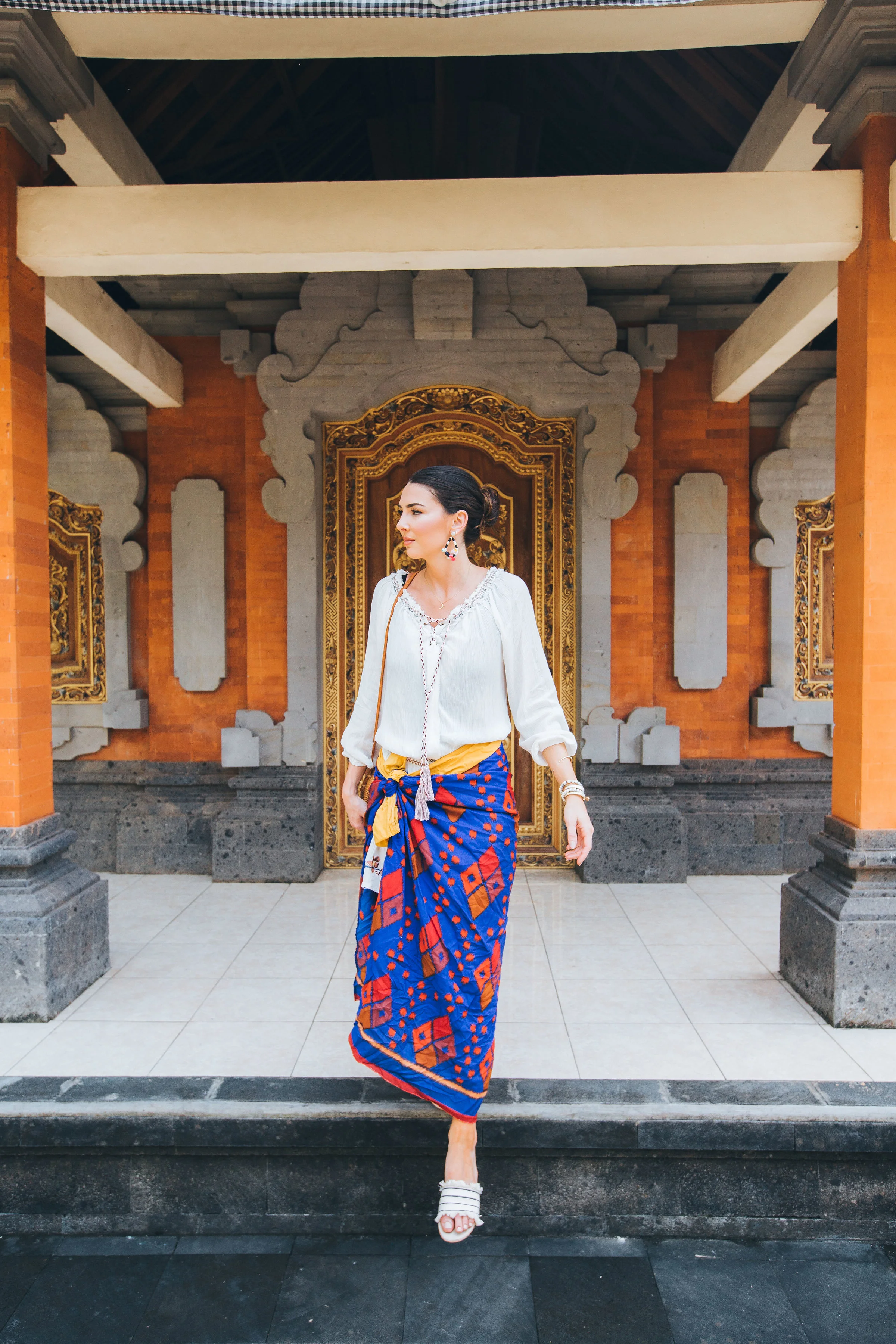 You have to wear a sarong to enter the temple, of which they give you there. Women must also pull their hair back! 