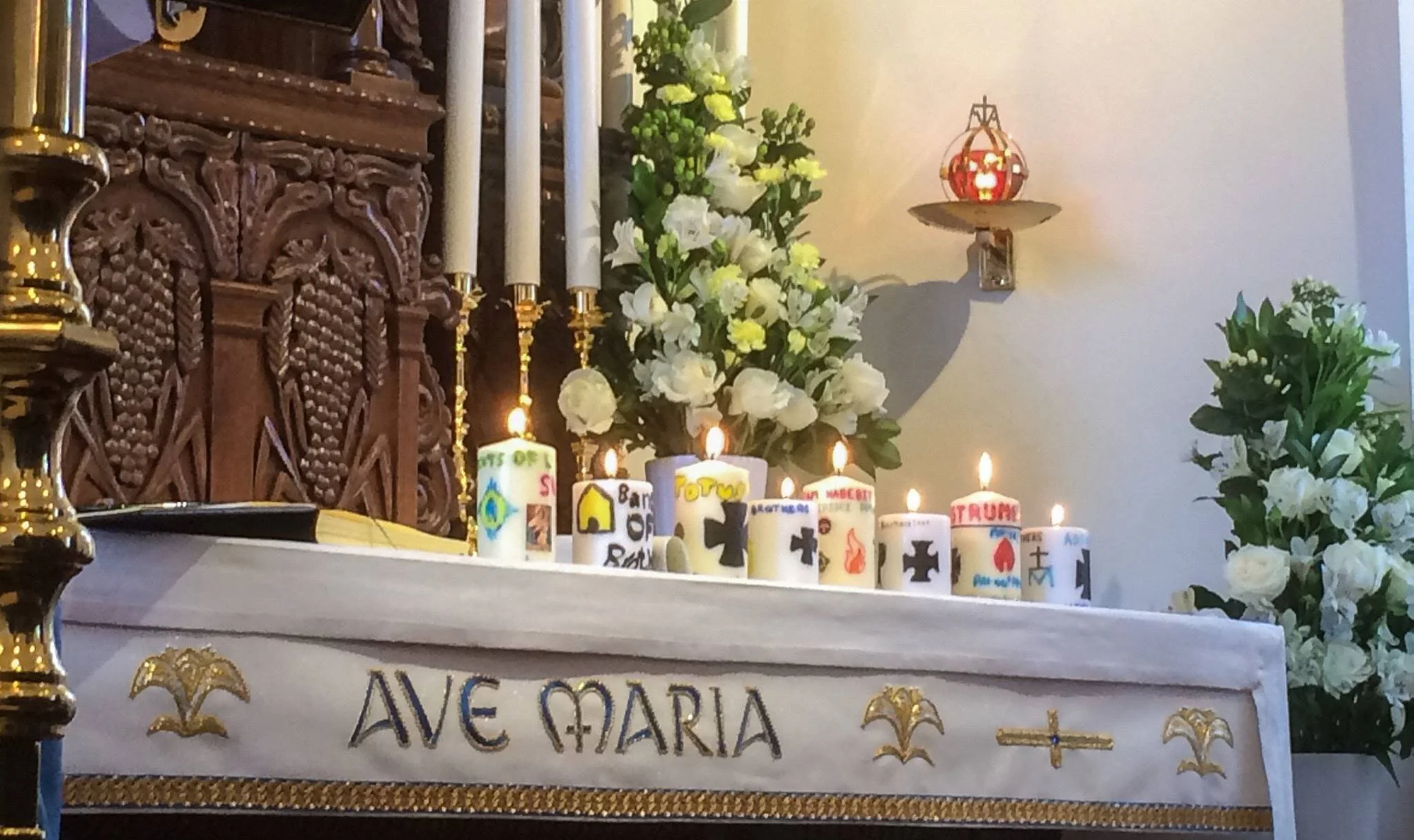 Covenant of Love Candles from the Schoenstatt University Men Presented on the Altar