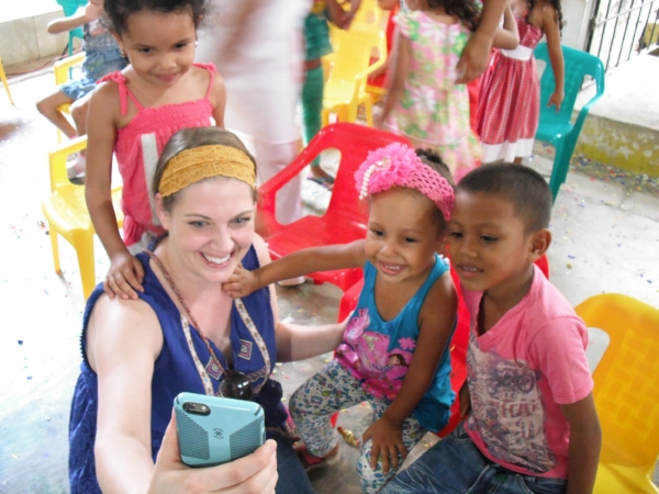 Michelle teaches the kids an important lesson. It is never too early to learn about "selfies."