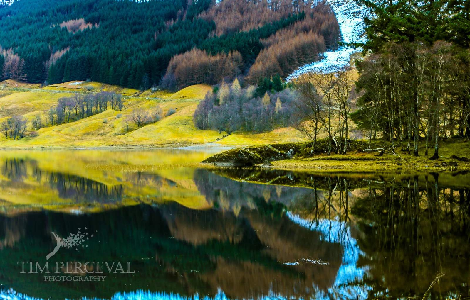 Last of the snow reflection on Loch Lubhair at Dusk