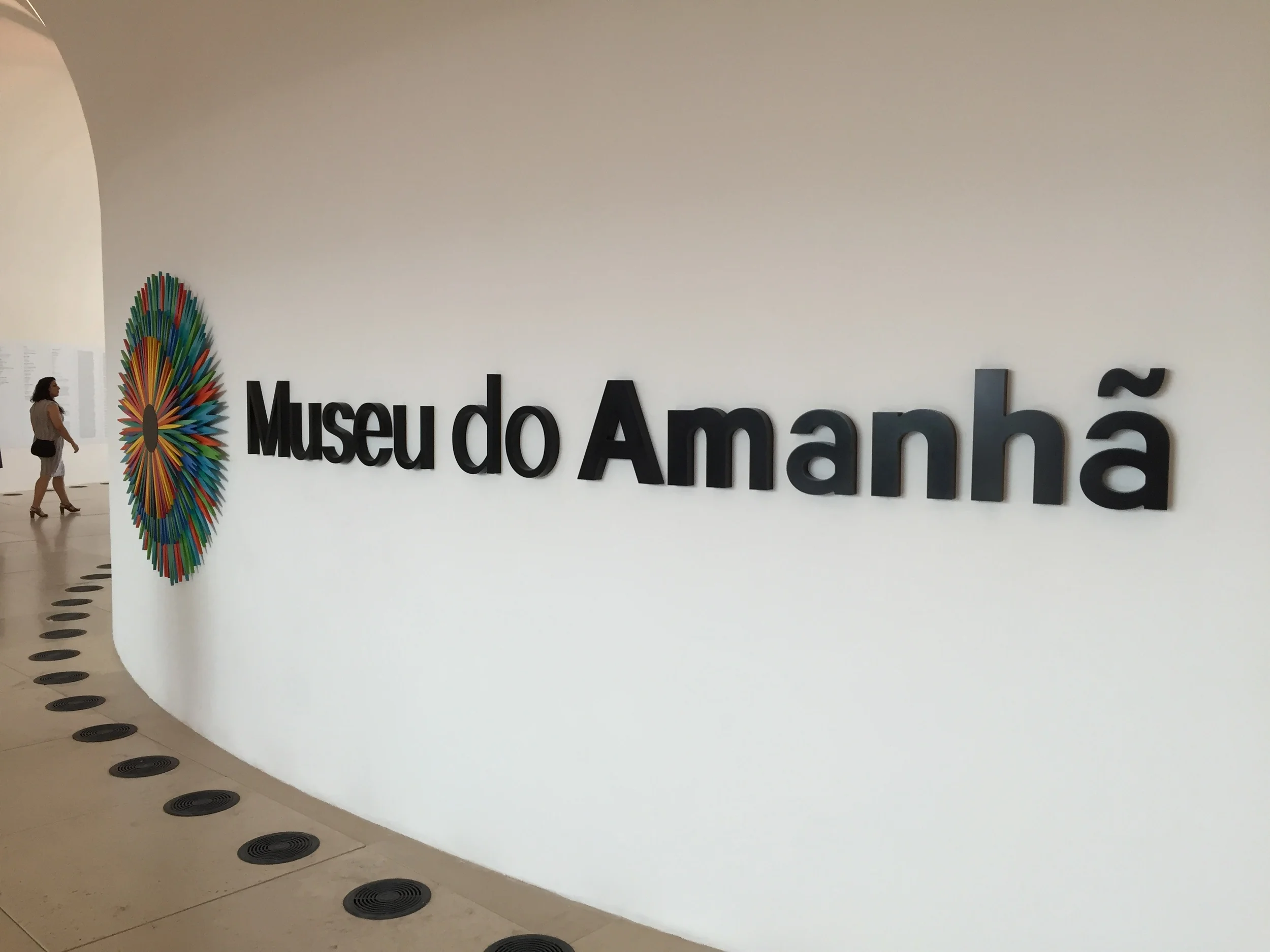  Museum logo fabricated in Corian and applied onto the lobby's curved wall. 