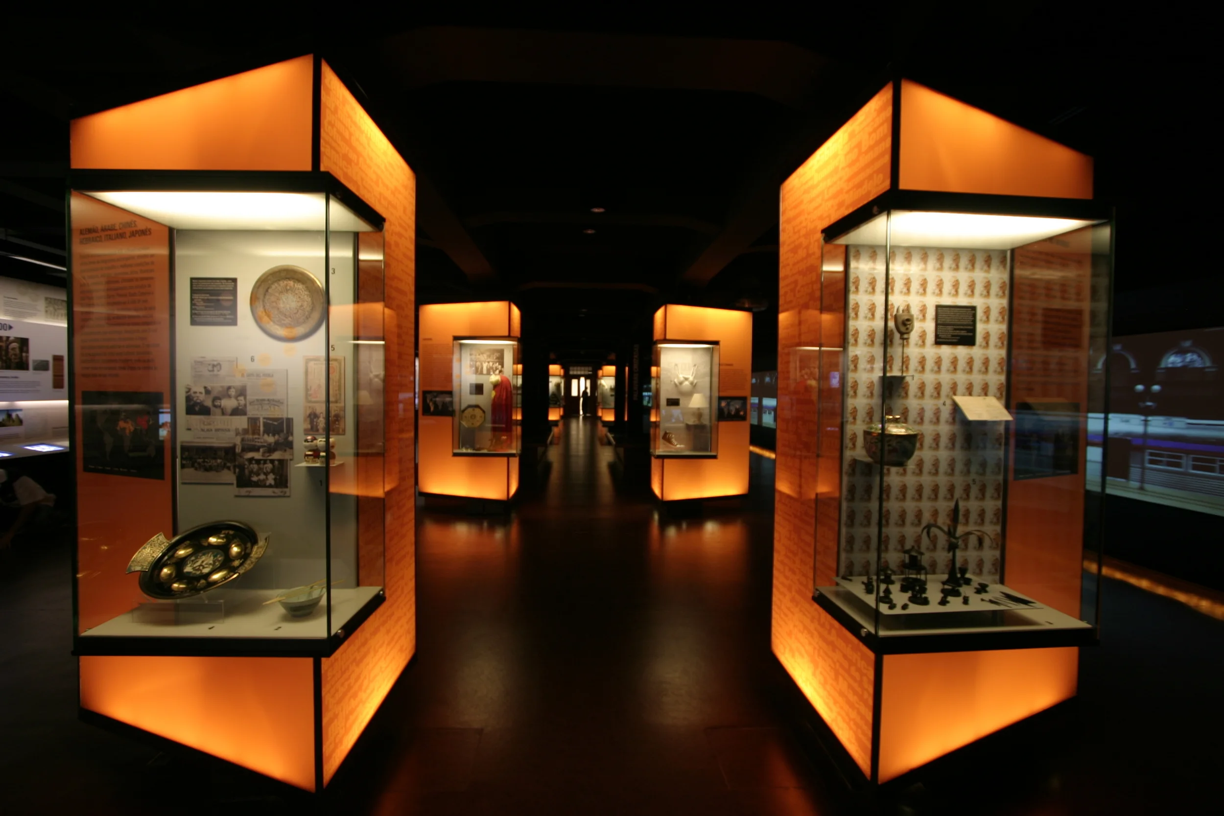  Another side has cases showcasing curated objects whose words have been imported by Brazilian Portuguese. 