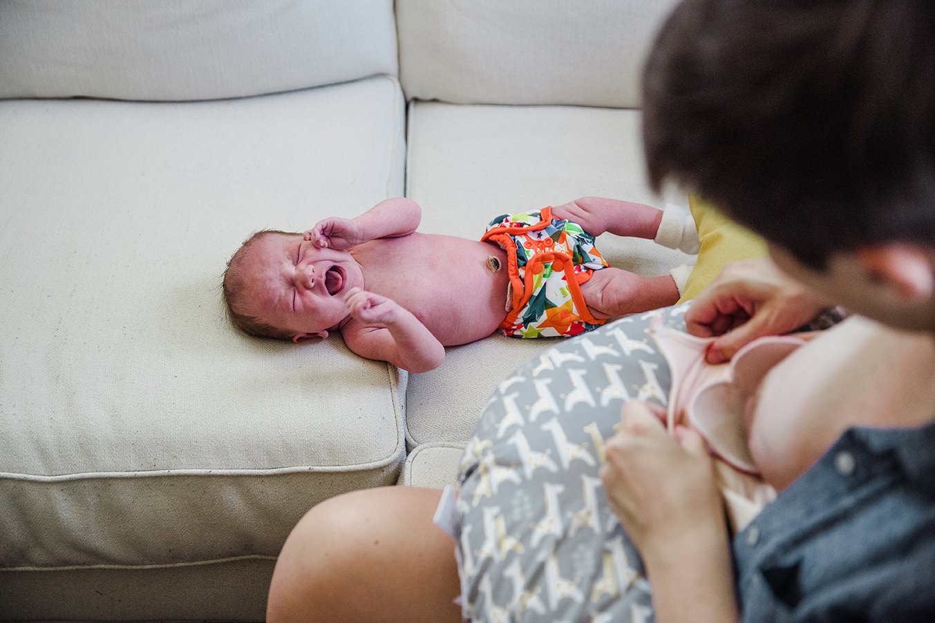Emily & Eleanor "The first few weeks of breastfeeding were emotional chaos. The magic of feeding Eleanor with my own body was instantaneous, but it was immediately accompanied by self-doubt, fear, pain, and loneliness. By the third day I was certain I couldn’t continue. By the sixth day I was certain I could. By the tenth I wasn’t certain of anything. Now I can’t stand to think of the day that I finally stop nursing her. So many memories of her first weeks have faded in the months that have followed, but I can summon the simultaneous joy and dread of her first few feedings with no effort at all."