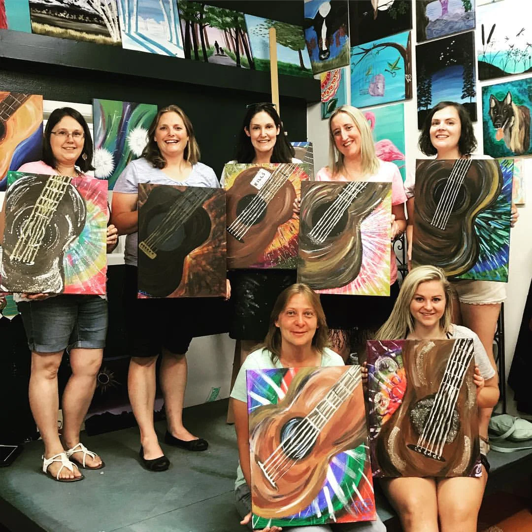 The "I Do Crew" painted 'Guitar' for the start to a bachelorette party.