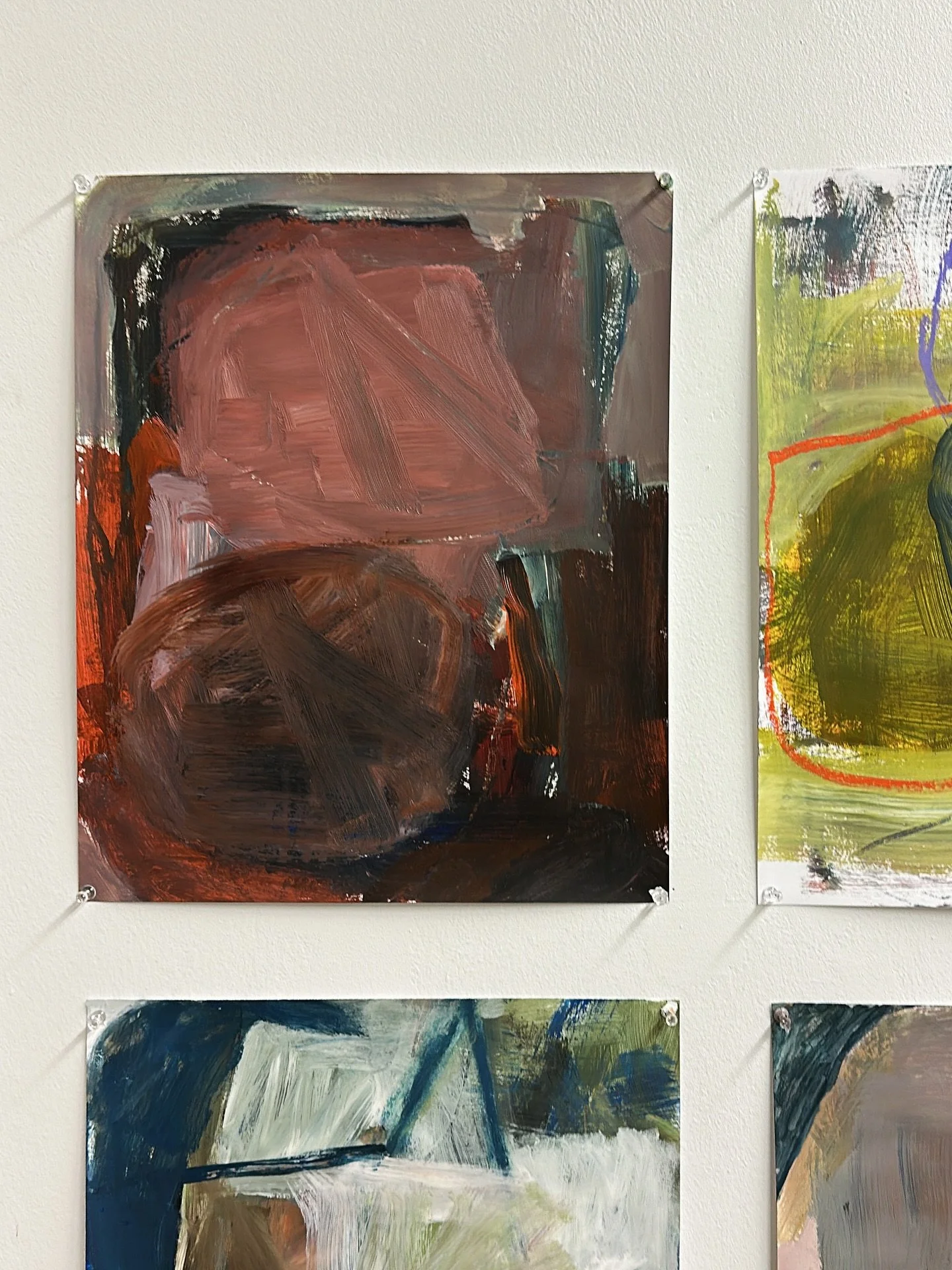 This piece is simple and child-like. I like the two large shapes with the triangle brushstrokes. The color palette is dark and understated with the hints of bright red and green. I like how a piece can be so simple yet so interesting. Judith said thi