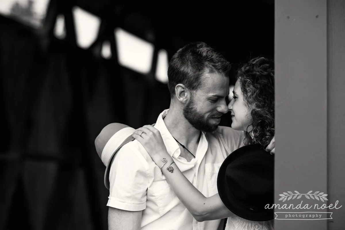 Springfield OH Engagement Photographer | Amanda Noel Photography | stylish lifestyle engagement session covered bridge and field at sunset black and white