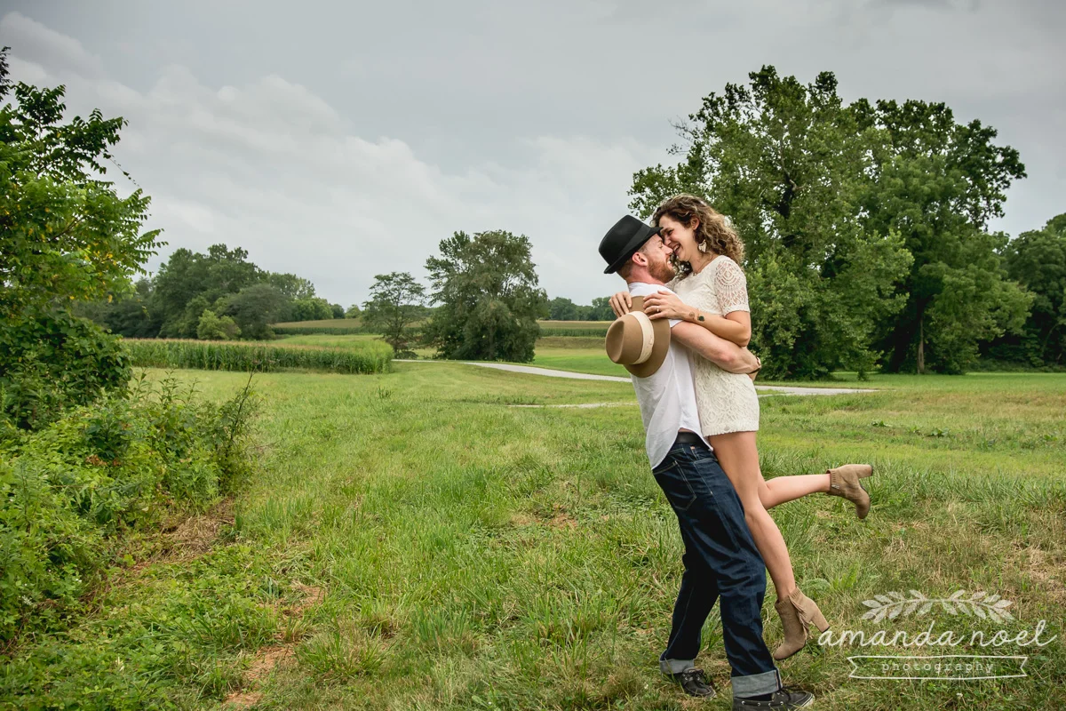 Springfield OH Engagement Photographer | Amanda Noel Photography | stylish lifestyle engagement session covered bridge and field at sunset