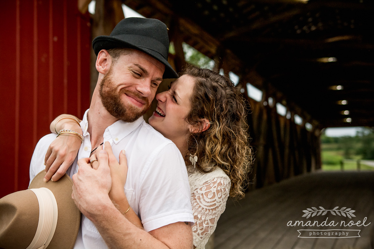 Springfield OH Engagement Photographer | Amanda Noel Photography | stylish lifestyle engagement session covered bridge and field at sunset