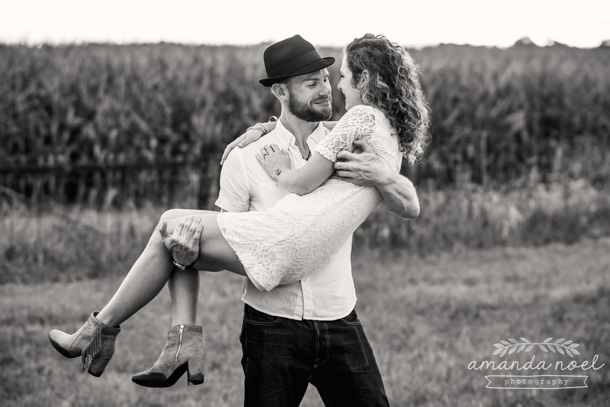 Springfield OH Engagement Photographer | Amanda Noel Photography | stylish lifestyle engagement session covered bridge and field at sunset