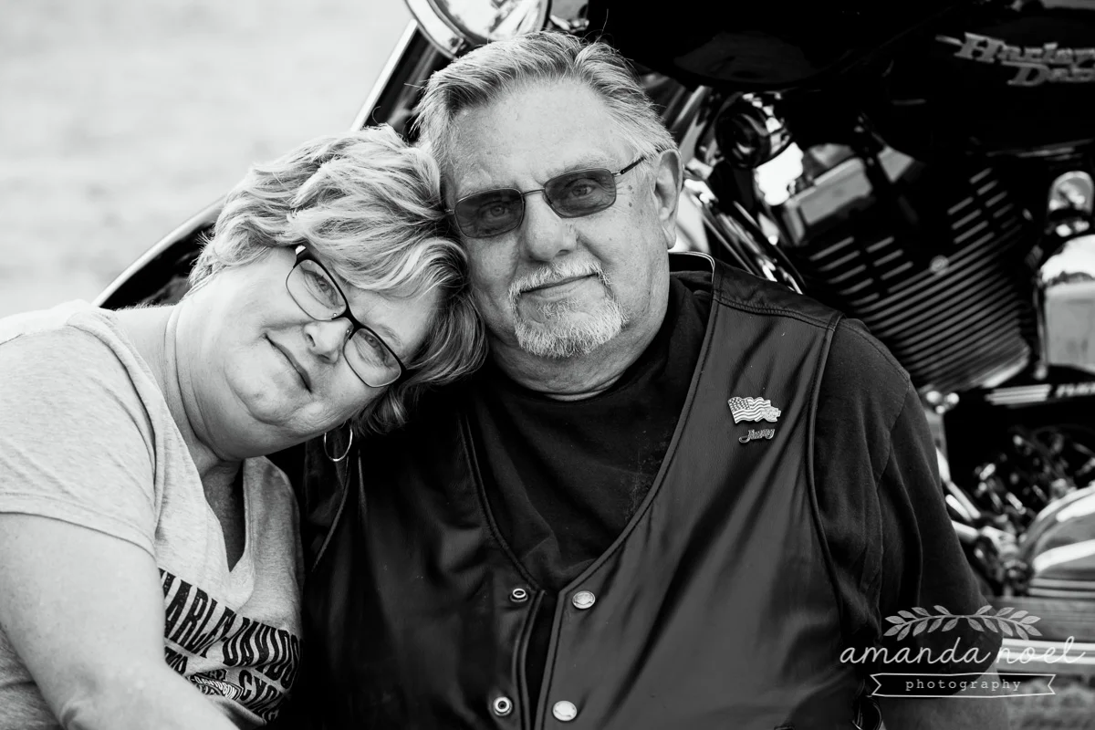 Amanda Noel Photography-ohio-couple-with-motorcycle-backlight-golden hour-3.jpg