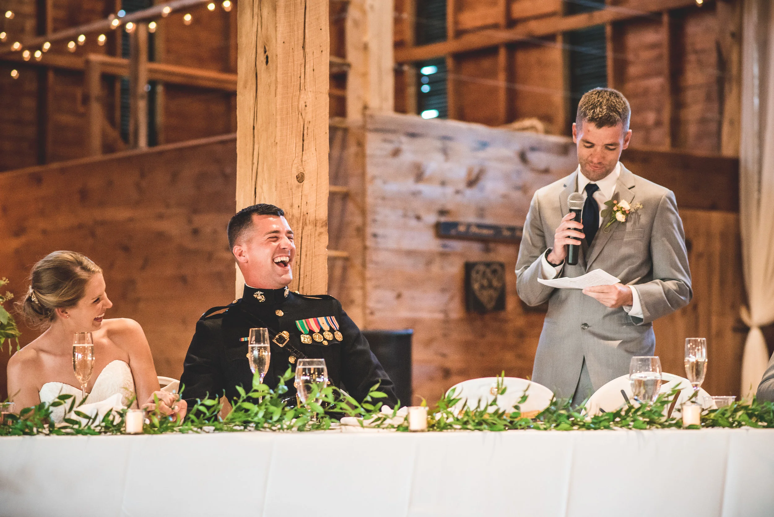 best man toast in barn