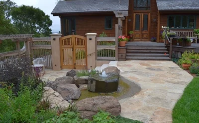 Mill Valley entry with custom gates and water feature