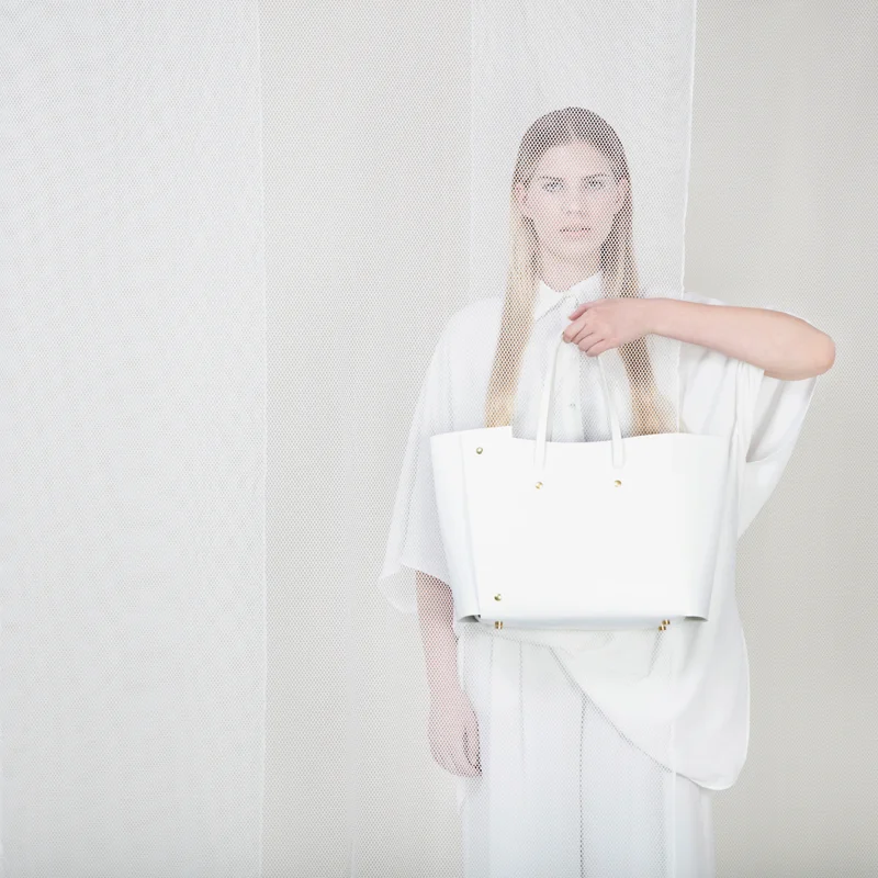 sq-tote-white-model.jpg