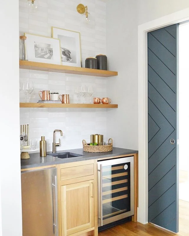 It&rsquo;s Friday and this full stocked wet bar is perfect for being quarantined at home. #tammytrylkointeriors #interiordesign #dallasinteriordesign