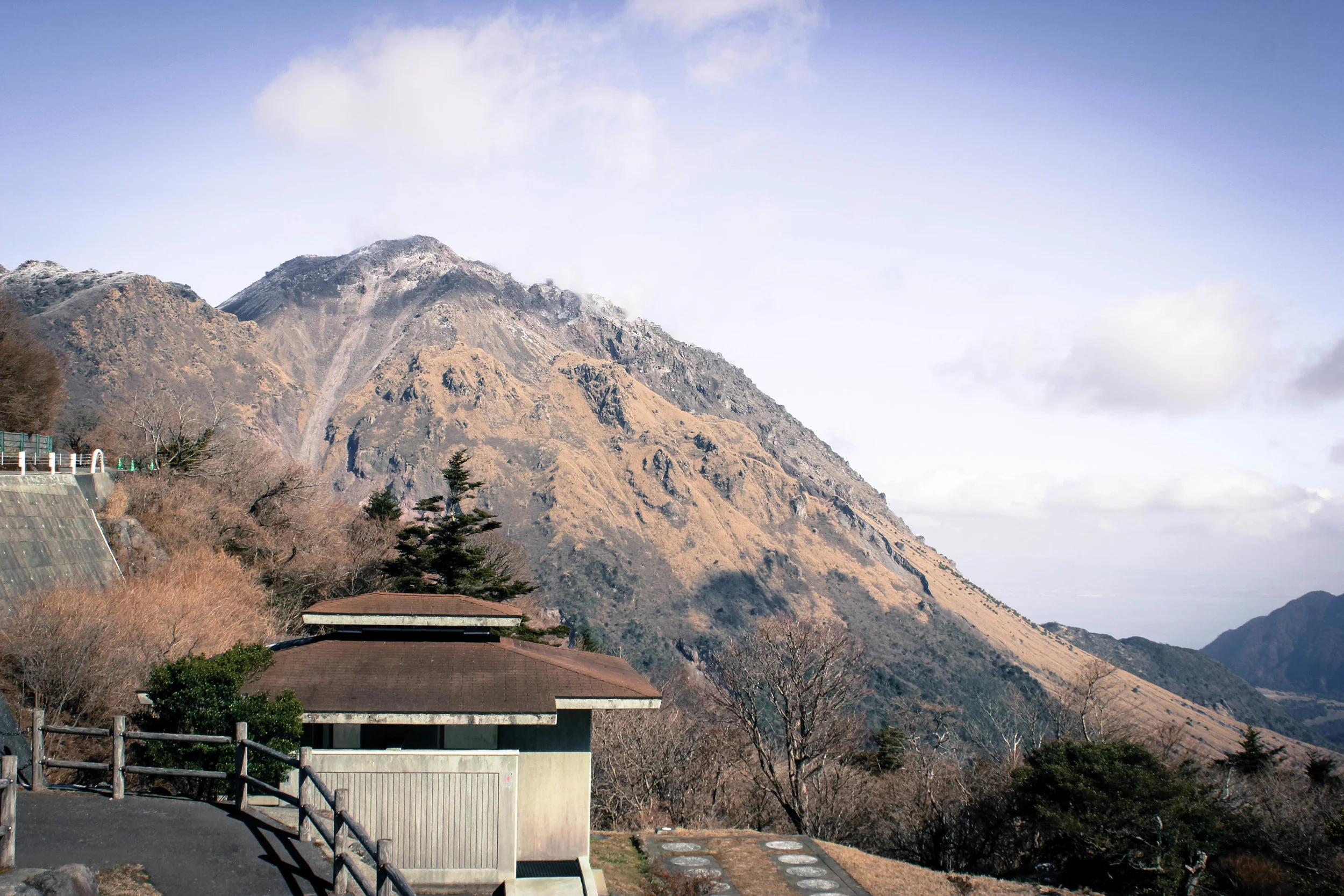 If you look closely at the mountain you can see a line between the lower brownish part and the upper mountain ridges. What's super neat is that the mountain above this line has actually formed since the 1990s! Due to volcanic activity the mountain is growing at a very rapid pace.