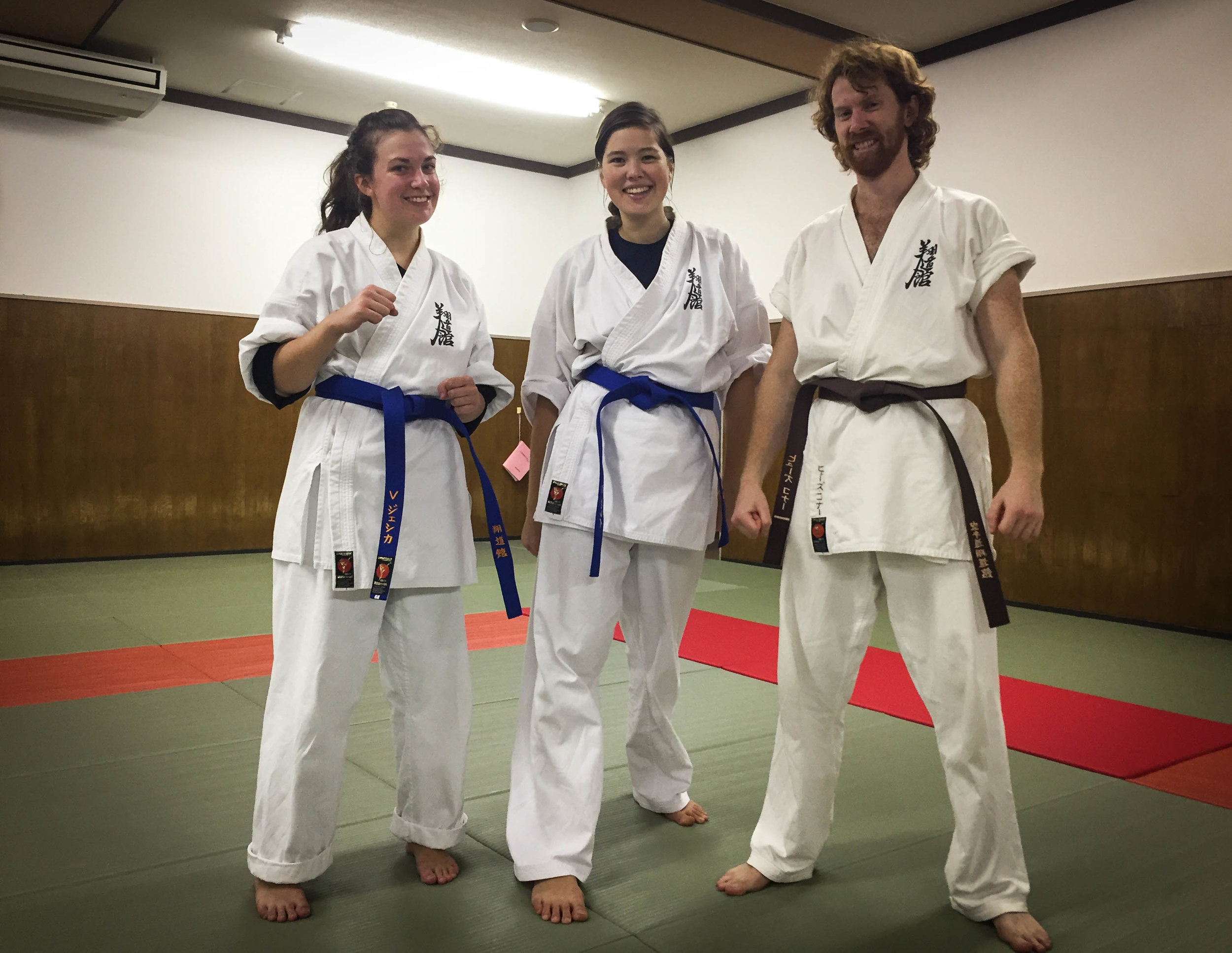 Our first coloured belt-- blue! But more importantly, where did my left arm go?? 